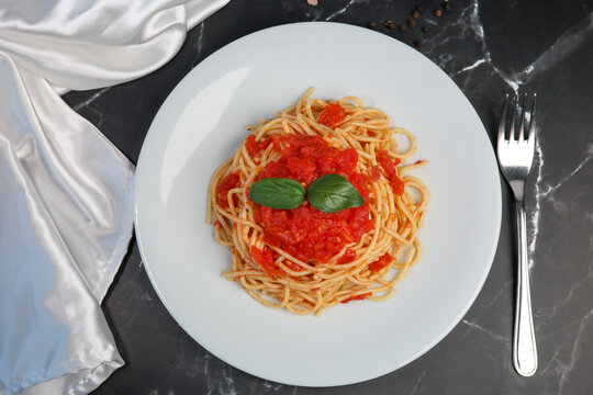 spaghetti pasta with tomato sauce and basil