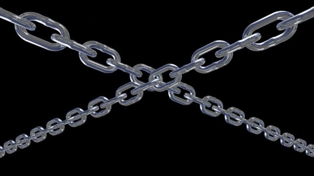 Two steel chains intersecting to form an x shape against a black background