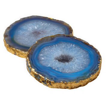 Two blue agate slices on golden surface