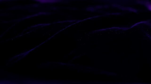 Electric blue, magenta and ultraviolet gradients move behind transparent polymer folds in a stylish seamless abstract background.