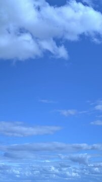Light clouds are moving across the blue sky