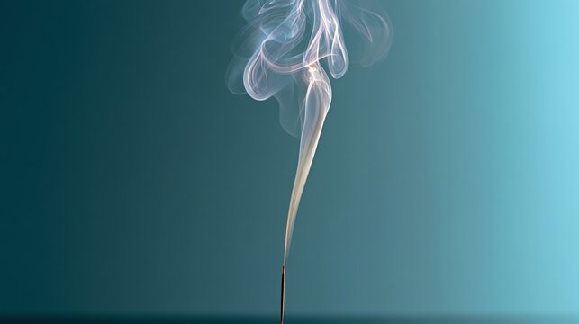 Elegant incense smoke spiraling in calm air.