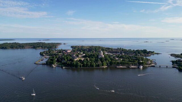 Aerial drone footage of Suomenlinna sea fortress and its surrounding islands in Helsinki, Finland.