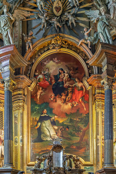 Closer view of the gilded altarpiece painting of the Madonna inside Saint Michael's Church, in Central Europe
