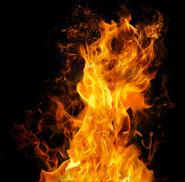 A vibrant flame dancing in the darkness&mdash;an expression of warmth and energy.