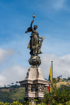 Centenary of Ecuadorian Independence Monument with National Flag under Blue Sky
