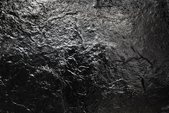 Black metal background or texture. Dark metal surface.