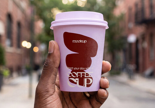 Hand Holding Coffee Cup Mockup