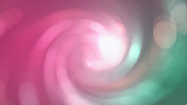 Abstract Pink and Mint Gradient Swirl Light Blur Background - A soft, blurred swirl of pink and mint green colors creates an abstract background effect.