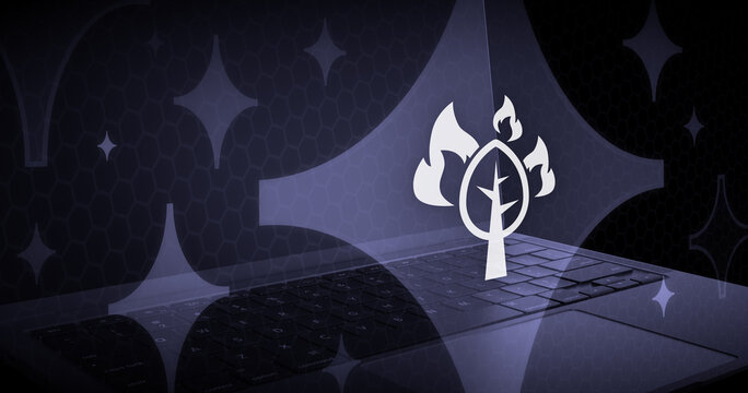 A glowing artificial intelligence concept illustration displays a burning tree symbol above a laptop keyboard, surrounded by magical sparkles and futuristic neon lights.