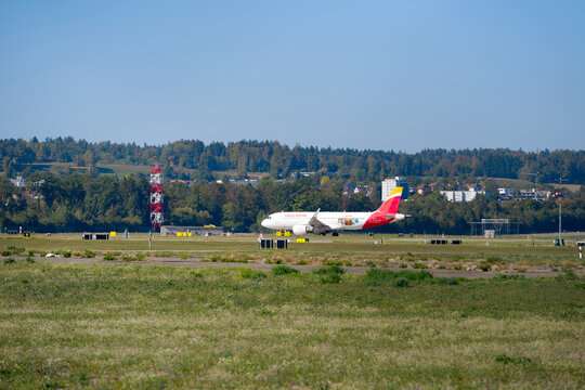 Iberia airplane Airbus A320-214 EC-MCS 75 anos volando a Puerto Rico Sticker at Swiss Z&uuml;rich Airport on a sunny autumn day. Photo taken September 22nd, 2026, Zurich Airport, Switzerland.