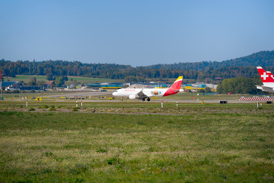 Iberia airplane Airbus A320-214 EC-MCS 75 anos volando a Puerto Rico Sticker at Swiss Z&uuml;rich Airport on a sunny autumn day. Photo taken September 22nd, 2026, Zurich Airport, Switzerland.