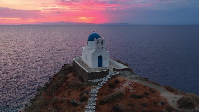 Sifnos island in Greece, famous chapel of Seven Martyrs at sunrise on Sifnos island, traditional Greek Orthodox church, aerial view of a church on Sifnos, the Cyclades