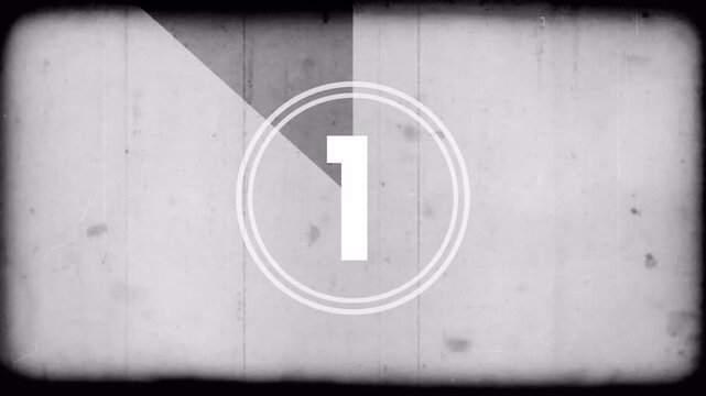 old film countdown from 5 to 0 number with grey background, vintage defocused film look, flicker, grain and scratches effect. 4k Video