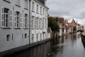 Fototapeta premium Canal with historic buildings in Bruges, Belgium