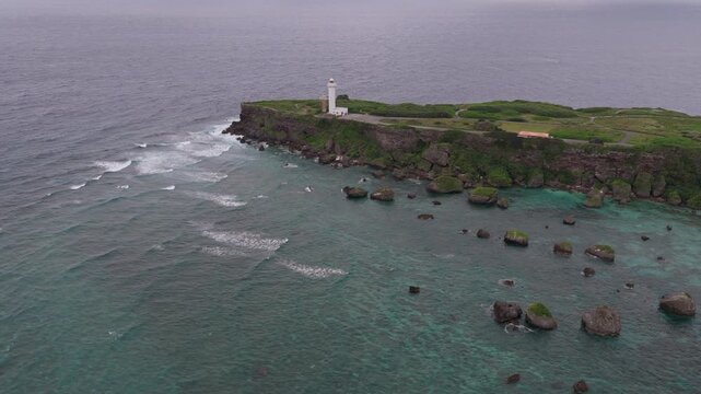 Cape Higashi-hennazaki And The Hennasaki Lighthouse On Miyako Island In Okinawa, Japan. - aerial shot