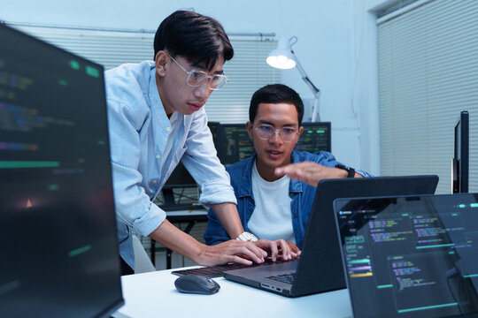Programmers Collaborating on Software Development and AI Code