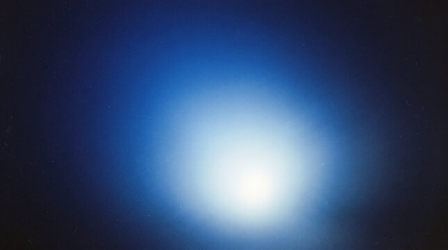 Abstract deep blue glowing light background with soft gradients