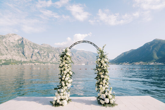 Wedding Ceremony Arch on Pier with Mountain and Sea View in Bajova Kula Montenegro