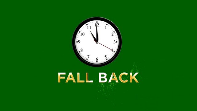 Daylight saving time concept with analog wall clock and golden fall back text on green background