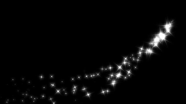 Fast white star streaks with shimmering glitter dust, magical pixie particles, sparkling fairy light trail and festive transition animation on black screen background in 4k