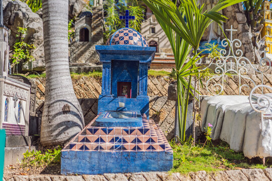 Decorative small buildings, crosses and bright details show Mexican folk art, cultural heritage, Day of the Dead style and travel background concept