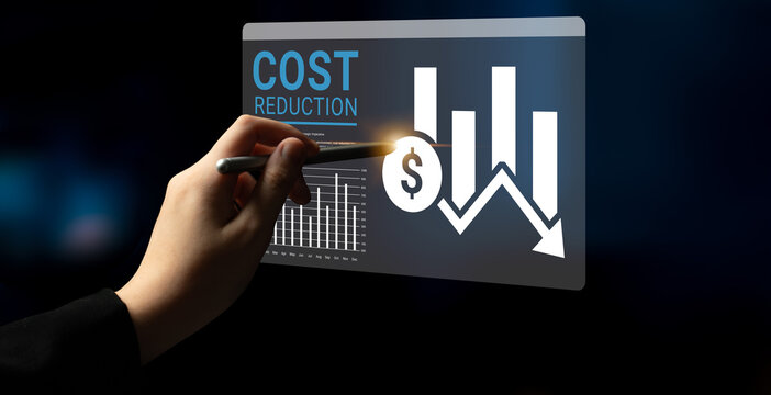 Hand interacts with digital screen that displays cost reduction graphics, showcasing financial trends and metrics essential for effective economic analysis and business strategy. Ledger