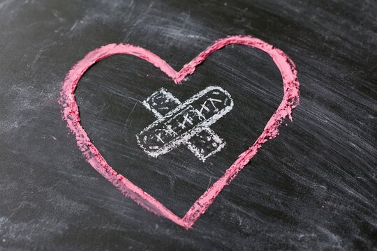 The Heart on Chalkboard: Healing Bandage Illustration in Soft Pink Chalk