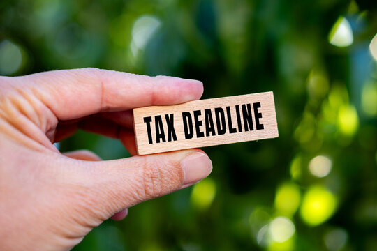 Tax deadline text concept photo