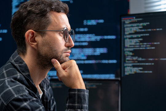 Programmer prepares a secure release, verifying environment configs and running final tests before pushing updates.