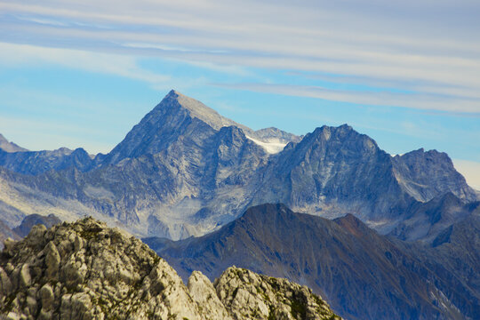 The pyramid of the Adamello Alpine peak (3,539 meters above sea level - 11,611 ft) and Corno Miller.  Valcamonica, Province of Brescia, Lombardy, Italy