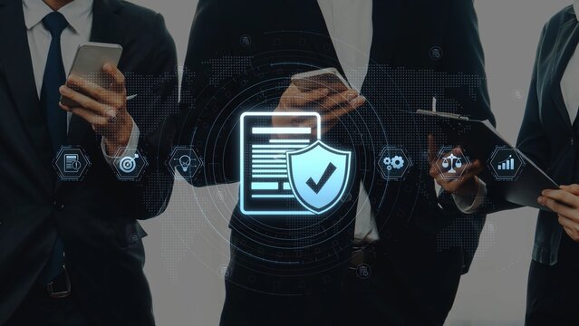 Business professionals engage with smartphones and tablets, symbolizing the intersection of technology and security in a dynamic corporate environment. Raster