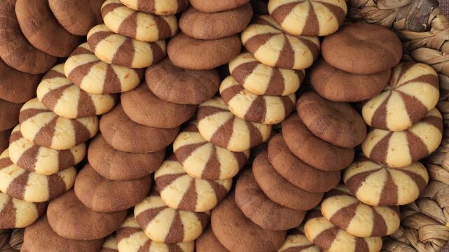 Assorted chocolate and vanilla cookies background