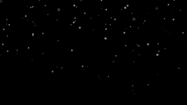 Snow particles fall across black background in winter display. This snowfall effect adds calm motion and minimalist seasonal look, with scattered flakes visible through dark space.