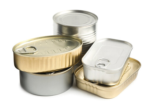Many closed tin cans isolated on white