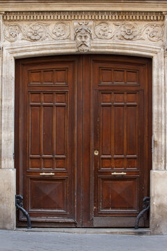 Parisian French Wooden Double Door With Ornate Baroque Style Bas Relief Pediment 