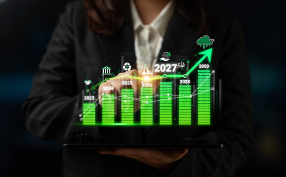 Business Professional Analyzing Sustainable Development Trends with Digital Graph Representation for Future Planning and Growth Projections Sigmoid