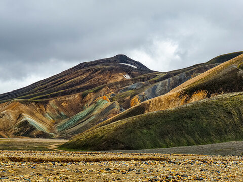 Landmannalaugar mountain range and valley. Icelandic landscape in the Fjallabak Nature Reserve of the Highlands. Natural wonder surrounded by rhyolite mountains, lava fields. Laugavegur Trail, Iceland