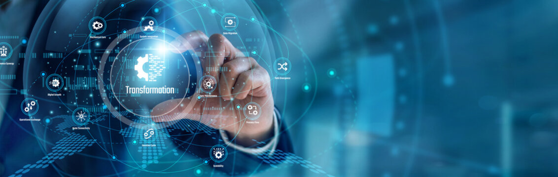 A strategy consultant handhold Transformation frameworks. Executive using tools mapping corporate restructuring and cloud integration metrics on unified dashboards. Modern enterprise evolution.
