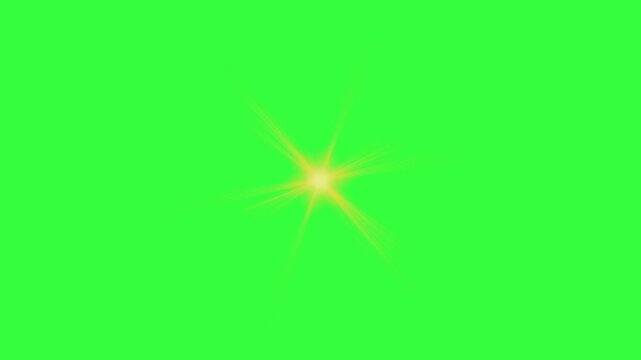 Star shinning light optical lens flare effect on green background chroma key, Golden shinning