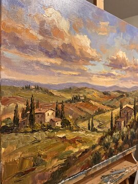 A vibrant original oil painting capturing the beauty of the Tuscan countryside. Rolling hills, traditional villas, and tall cypress trees are rendered with thick impasto textures under a colorful sky.