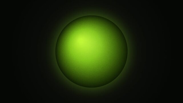 Glowing green sphere on black background