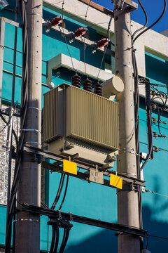 Pole-mounted high-voltage transformer