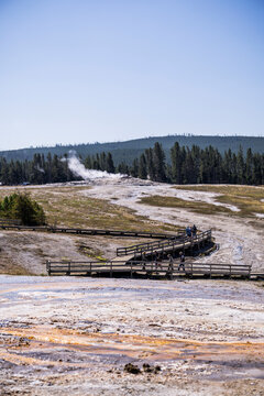 Geothermal Geysers and Colorful Hydrothermal Landscapes Around Old Faithful in Yellowstone National Park, Wyoming, USA