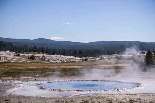 Geothermal Geysers and Colorful Hydrothermal Landscapes Around Old Faithful in Yellowstone National Park, Wyoming, USA