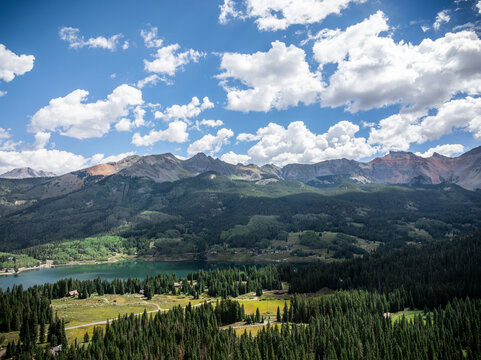 Scenic Blue Mountain Lake Surrounded by Red Rocky Peaks at Lizard Head Pass, Colorado, USA