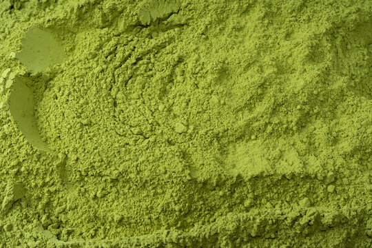 Matcha tea, matcha powder as a background.