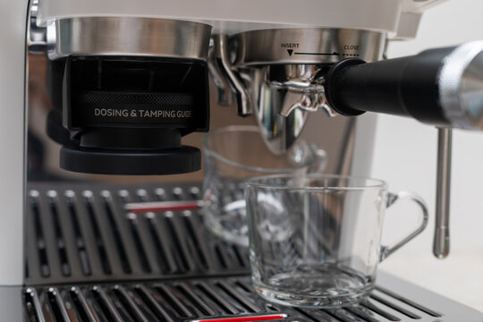 Modern Stainless Steel Espresso Machine with Built-In Coffee Grinder