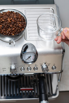 Modern Stainless Steel Espresso Machine with Built-In Coffee Grinder