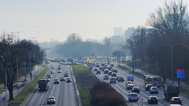 Morning Traffic on Busy City Highway in Warsaw, Poland at Sunrise